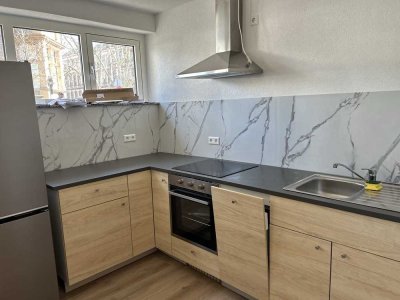 Erstbezug nach Renovierung – helle 1-Zimmer-Wohnung mit neuer Küche, Stellplatz und Keller