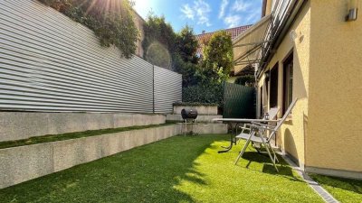 Provisionsfrei: 4-Zi.-EG-Wohnung mit 80 m² Garten,  Klima, Tiefgarage & Hobbyraum