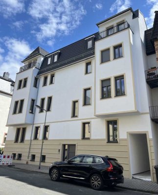 Luxuriöses Wohnen auf zwei Ebenen – Neubau-Erstbezug mit 4 Zimmern, Designküche, zwei Südbalkonen