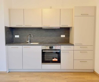 Tolles Neubau- Appartement mit Einbauküche, Fußbodenheizung, Loggia, Lift, Tiefgarage etc