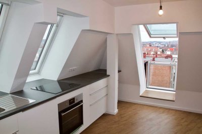 Energetisch modernisierte DG-Wohnung mit Einbauküche und Regendusche