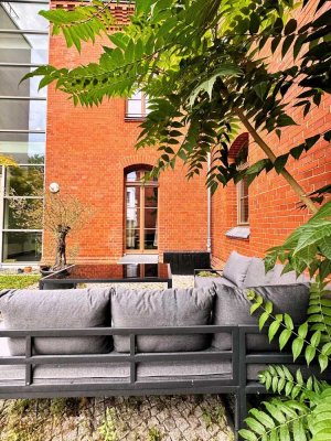 Einzigartiges Wohnen in Potsdam: 2-Zimmer-Wohnung mit privater Hofterrasse, Balkon & Stellplatz
