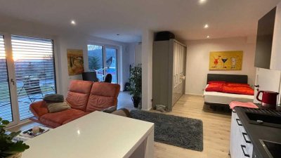 Helle 1-Zimmer-EG-Wohnung mit Terrasse & Garten – ruhig am Wald gelegen