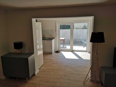 Attraktive 1,5-Zimmer-Wohnung mit großer Terrasse und Einbauküche in Bodenheim - optimal für Pendler
