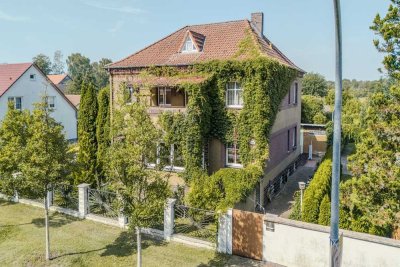 Historisches Zwei-Familien-Haus mit Gewerbeeinheit und großem Naturgrundstück in Schmachtenhagen