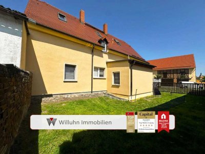 120 m² Gartenwohnung mit 2 Stellplätzen und 2 Bädern
