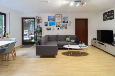 Die Sonne genießen: vermietete Souterrain-Wohnung mit eigener Terrasse und Freistellplatz