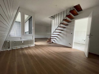 Sanierte 4-Zimmer-Wohnung mit Balkon, schöner Aussicht und Einbauküche