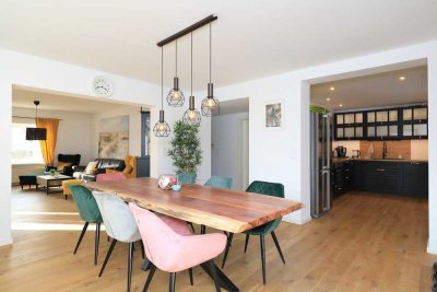 Räumlich attraktive 4-Zimmer-Wohnung mit 2 Terrassen, Garten und ausgebautem Souterrain