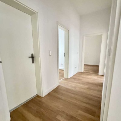 Einziehen und genießen – Neuwertige Wohnung mit eigenem Garten in bester Wohnlage