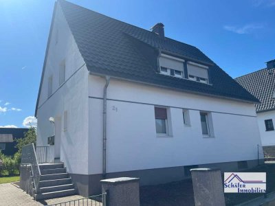 Ihr liebevolles Refugium: Einfamilienhaus mit blühendem Garten und Dachausbau-Möglichkeit