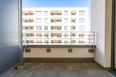 Lichtdurchflutete Wohlfühloase mit moderner Markenküche und großzügiger Loggia