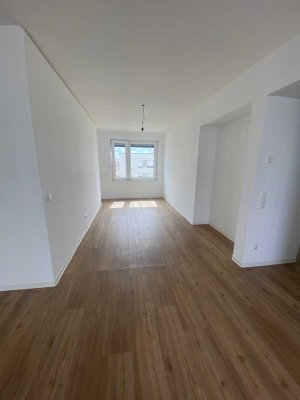 Helle 2-Zimmer-Wohnung mit traumhafter Dachterrasse und Top-Lage im Grünen