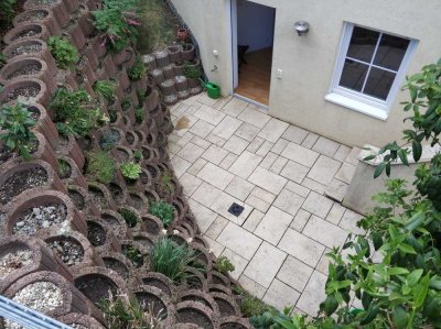 Charmante 2-Zimmerwohnung mit Terrasse in ruhiger Feldrandlage von Harxheim