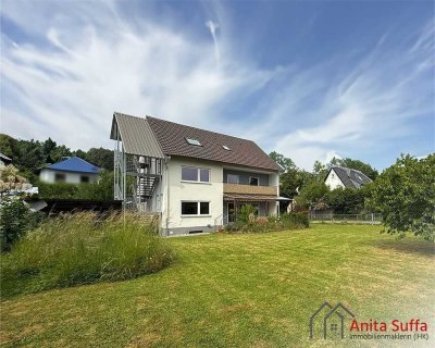 Attraktives Mehrfamilienhaus mit großem Grundstück zu verkaufen!