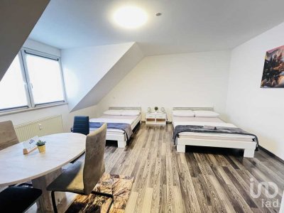 Charmante
Dachgeschosswohnung mit zusätzlichem Ausbaupotenzial