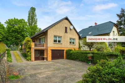 IMMOBERLIN.DE - Attraktives Haus mit großem Südgarten & Garage in sehr familiärer Lage