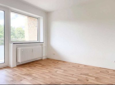 Schöne Einzimmerwohnung mit Balkon in Grün