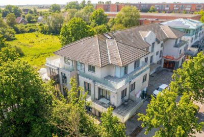 Zentral gelegenes Penthouse mit großer Dachterrasse und Stellplatz – vermietetes Anlageobjekt