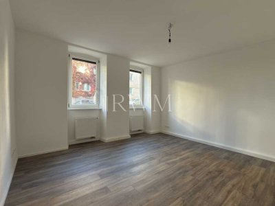 Wohnen im Herzen der Stadt – Charmante 2-Zimmer-Altbauwohnung mit Einbauküche