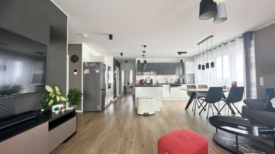 Exklusiv & energieeffizient – Top ausgestattete 4-Zi.-Wohnung mit Balkon & 2 TG-Stellplätzen