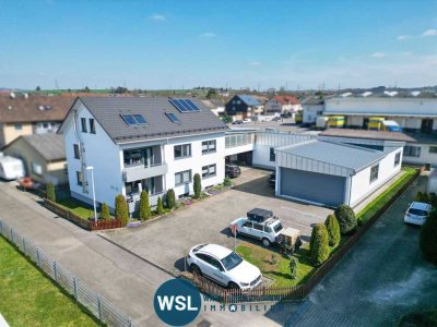 Hochwertig modernisiert, sehr gepflegt! 3-Familien-Wohnhaus mit Doppelgarage und Gewerbe-Halle.