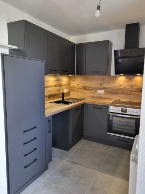 Erstbezug nach Sanierung - Attraktive 2 Zimmer Wohnung inkl. Einbauküche und Tiefgaragenstellplatz