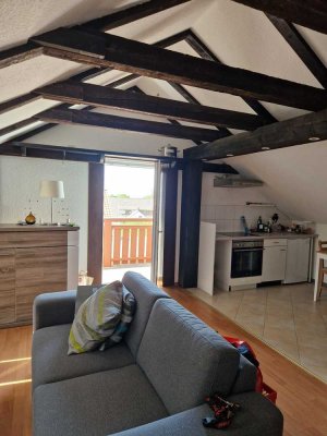 Geschmackvolle 1-Raum-Wohnung mit Balkon und Einbauküche in Achim