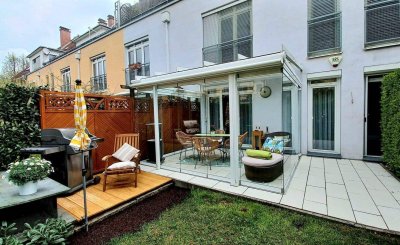 Charmante Gartenwohnung 74m² mit traumhaft schönem Wintergarten und Tiefgaragenplatz