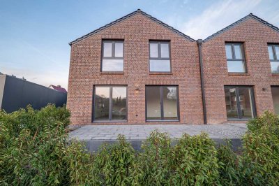 Exklusive Doppelhaushälfte in zentraler aber naturnaher Lage!