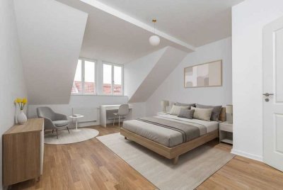 Sanierte 2-Zimmer-Dachgeschosswohnung mit ausgebautem Dachboden