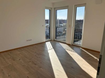 Moderne 1-Zi.-Wohnung mit EBK & Balkon, nahe UNI/WISTA, 10 Min. zur S-Bahn – ab 12/2025 Erstbezug!