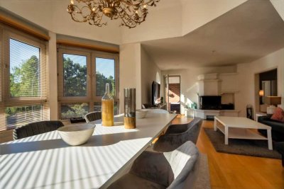 Effiziente Wohnung mit Kamin, Loggia, Balkon & Tiefgaragen-Stellplatz