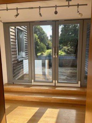 Geschmackvolle und geräumige Maisonette-Wohnung mitten Im Grünen