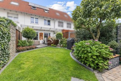 Wohlfühl-Oase mit Gartenidylle: Reihenhaus mit Solaranlage, Garage & viel Platz unterm Dach