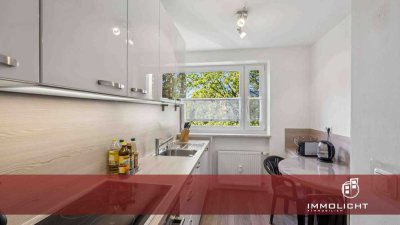 Im Grünen wohnen - Top gepflegt, neues Bad, EBk, TG-Stellplatz.