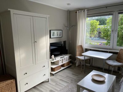 Komplett möbliertes, modernes 1-Zimmer-Apartment mit Gemeinschaftsgarten