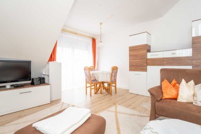Sonnige Rückzugsoase in Neuried 2-Zimmer-Dachgeschosswohnung mit Balkon