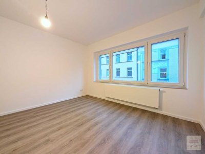 Zwischen Rheinturm & Lorettostrasse: Saniertes Apartment mit Wohnküche
