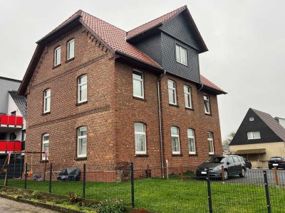 Eigentumswohnung mit Stellplatz
im Erdgeschoss eines Dreifamilienhauses