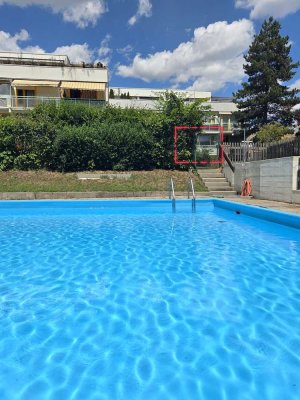 Sonniges Apartment mit Südbalkon, Pool & TG - grün, ruhig und top angebunden!