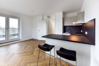 Hoch hinaus: Stilvolle 2-Zimmer-Dachwohnung mit großer Terrasse