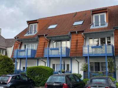 Gepflegte, helle Dachgeschoss Wohnung mit Tiefgaragenstellplatz