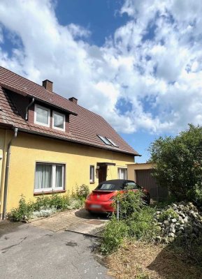DHH mit Garage in Dorfrandlage wartet auf neuen Leben
