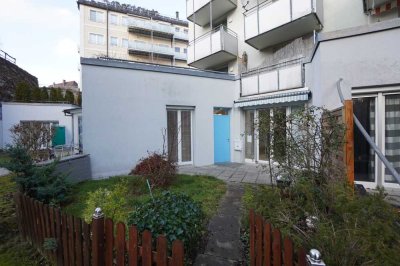 Schöne 2 Zimmer Wohnung mit Terrasse und kleinem Garten inkl. Einbauküche