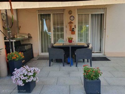 Helle Terrassenwohnung mit großem Garten & Tiefgarage – ruhige Lage