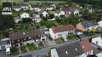 Familienfreundliches Einfamilienhaus mit Garten und Wintergartenplanung
