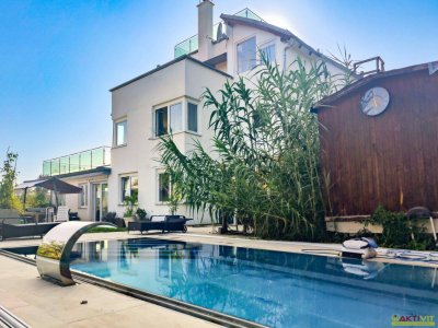 Panoramablick trifft Luxus: Exklusive Villa mit Pool und Seeblick in Krumpendorf.