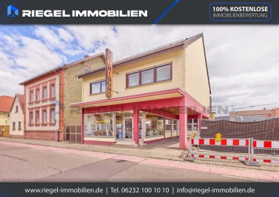 Sie hier? Wir auch! Vielseitiges Wohn- und Geschäftshaus mit Halle, Kapitalanlage oder Eigennutz