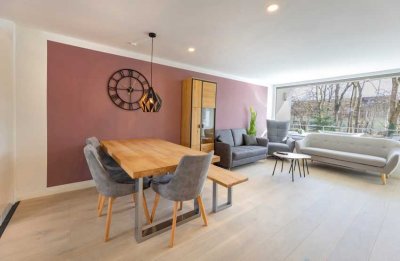 Sanierte große Zwei-Zimmerwohnung mit moderner Küche und Balkon mit Blick in den Park und zur Würm